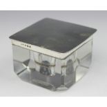 A silver topped Art Deco glass cube inkwell, Henry Matthews, Birmingham 1930, with canted corners,