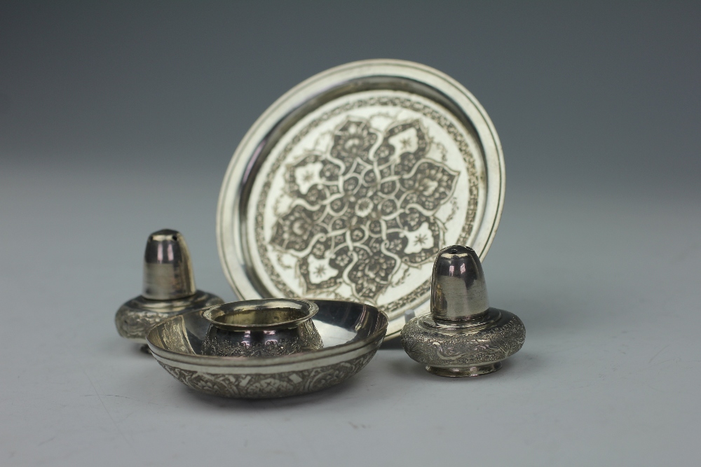 A Persian white metal condiment set, comprising a circular tray, two pepperettes and a salt, - Image 3 of 3