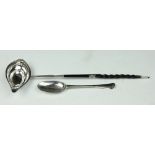 A George III silver toddy ladle with turned baleen handle 38cm long,