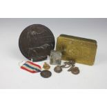 A World War I bronze death plaque or penny for Harry Curtis, believed to have been The Queens Bays,