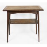 An Edwardian oak card table, with fold over top, on tapered legs,