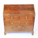 A George III mahogany bureau, with fall enclosing a fitted interior,