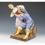 A continental faience group of a cavalier and a maid, 35cm, unmarked,
