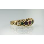 A DEAREST ring in 9ct gold, set with the seven graduated stones within decorative setting,