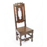 A 19th century provincial oak side chair, with pierced back and solid seat,