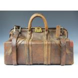 A World War II American officers leather bag, with green canvas interior,