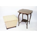 A Victorian mahogany ottoman / stool, with foliate ivory upholstery, on bun feet,