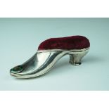 A silver shoe pin cushion, William Hair Haseler, probably Birmingham 1906, in typical Liberty style,
