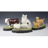 A selection of Beswick animals, comprising; a Hereford bull, with nose ring, 16.