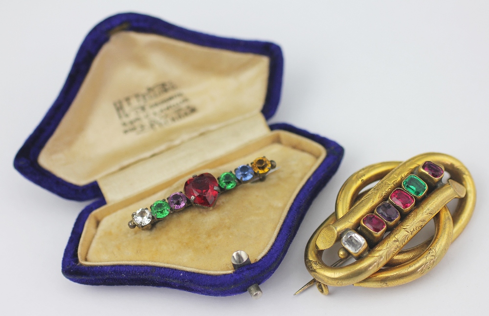 A Victorian REGARD brooch, designed as an entwined knot set with six paste stones, - Image 2 of 2