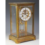 A 19th century French lacquered brass eight day four glass mantel clock,