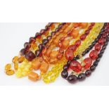 A collection of nine bead necklaces, to include; Victorian and later glass examples; plain beads,