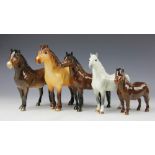 Five Beswick horses, to include; Highland dunn 18cm high, Exmoor 16cm high, Shetland 12cm high,