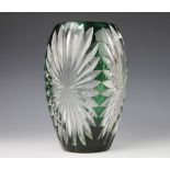 An early 20th century green and clear glass vase,