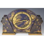 An Art Deco Chinoiserie lacquered mantel time piece, of fan shape,