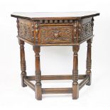A 1920's oak Jacobean style credence type table,