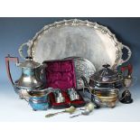 A selection of silver plated wares to include a set of six cased belt and buckle form napkin rings,