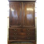 A late George III mahogany linen press,