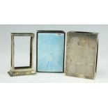 Three silver match box sleeves, to include; a blue enamelled example, Birmingham 1916, 7.