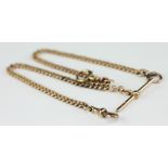 A 9ct gold curb link Albert and T-bar, 29gms,