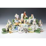 A quantity of porcelain figural strikers, 19th century and later, to include pairs,