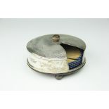 A silver circular match disc holder, London 1929,