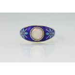 An opal and enamelled 9ct yellow gold ring, 'PSR', Birmingham 1975,