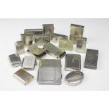 A collection of twenty three assorted base metal vesta cases, to include; silver plated,