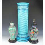 A large Burmantofts Faience turquoise glazed relief moulded pedestal, 64cm high,