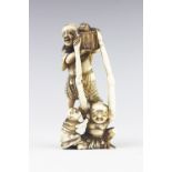 A Japanese ivory okimono of Ashinaga and Tenaga, Meiji period 1868-1912,