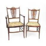 A set of four Edwardian inlaid mahogany salon chairs, including two with arms,
