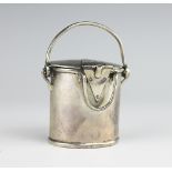 A silver match box holder in the form of a lidded can, 'A.
