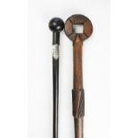 A late 19th century South African Zulu chiefs staff, with pierced metal bound terminal, 123cm,