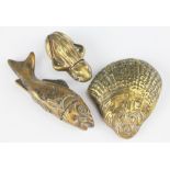 A brass vesta case in the form of a swimming fish 8.2cm long, a Victorian brass frog vesta 4.
