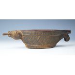 An Indian carved wood opium water drinking bowl or Kharal,