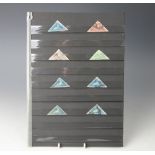 Eight Cape of Good Hope triangle stamps, comprising a blue one pence, a red one penny,