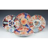 A pair of Japanese Imari porcelain dishes, 23.
