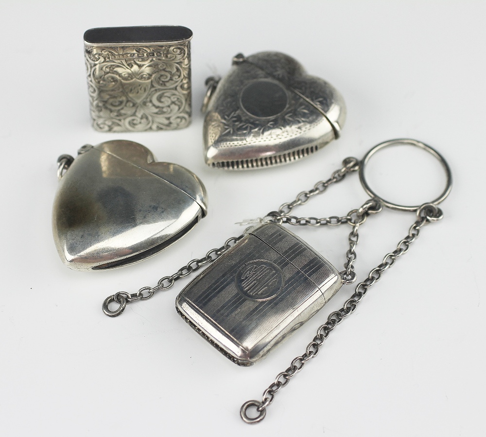 Four silver vesta cases, to include; Silver 900 standard heart shaped vesta 4.