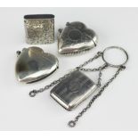 Four silver vesta cases, to include; Silver 900 standard heart shaped vesta 4.