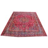 A Persian Heriz wool carpet,