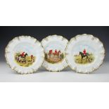 A set of three Royal Crown Derby plates depicting hunting scenes,