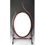 A French Hepplewhite style carved mahogany dressing table mirror,