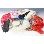 An assortment of vintage textiles to include a bead embroidered veil,