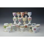 A collection of egg cups, including Crown Staffordshire, Cauldon, Paragon and Shelley China,