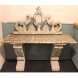 A continental painted pine and composite console type table, with pierced scroll back,