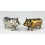 A silver plated pig form vesta and go-to-bed,