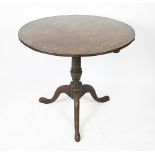 A George III mahogany tilt top occasional table, with circular top,