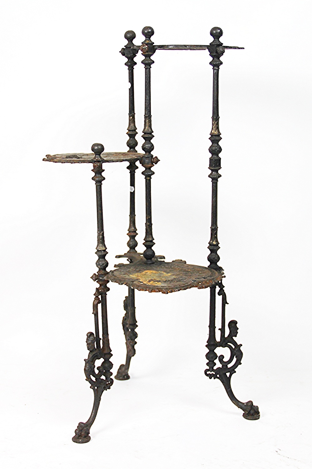 A Victorian cast iron three tier jardiniere stand, cast with birds and flowers,