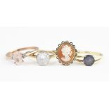Four gold rings, to include; a tourmaline and diamond set ring in 9ct rose gold,
