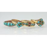 Four turquoise set rings, to include; a floral cluster,